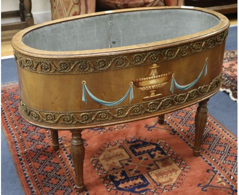 A mahogany oval inlaid planter