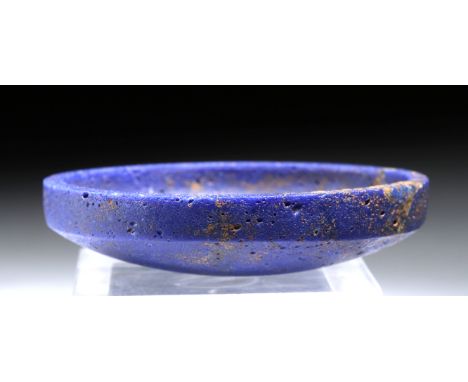 Ancient Egypt, New Kingdom, 18th Dynasty, ca. 1549 to 1292 BCE. A fabulous cup of a petite size formed from paste glass (know