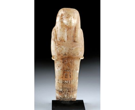 Ancient Egypt, New Kingdom period, 18th to 20th Dynasty, ca. 1550 to 1077 BCE. A stunning ushabti carved from creamy yellow a