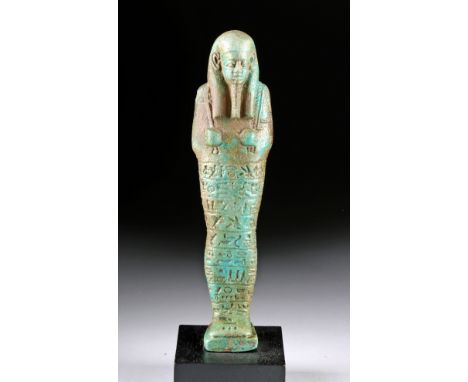 Egypt, Late Dynastic Period, 26th to 31st Dynasty, ca. 664 to 332 BCE. A beautiful mold-formed faience ushabti colored in ref