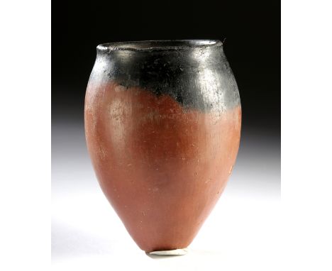 Ancient Egypt, Predynastic Period, Naqada II, ca. 3650 to 3300 BCE. A lovely pottery vessel with a highly-burnished, russet h