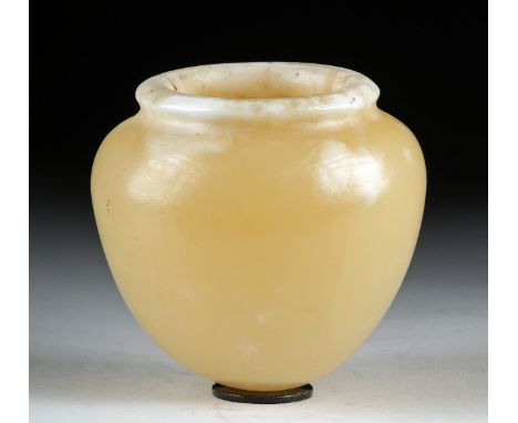 Egypt, Late Dynastic Period, 26th to 31st Dynasty, ca. 664 to 332 BCE. A beautiful jar of a petite size, hand-carved from hon