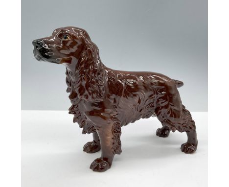 Glossy finish. Depicts a brown dog. Marked Goebel 3030. Issued: 20th centuryDimensions: 9''L x 3''W x 7''HManufacturer: Goebe