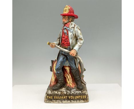 Limited-edition, hand painted figure is dressed in red hat, blue coat and holding firehose with flames at his feet. Creative 