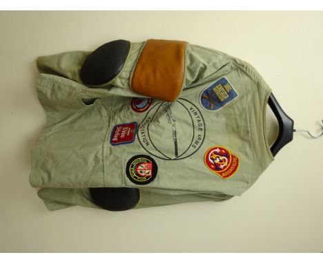 Lightweight shooting jacket, padded right shoulder and elbows, with Vintage Rifle Association decal and various shooting rela