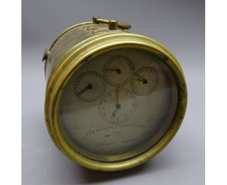 Early 20th century brass Hateley's Patent The "Homing" Pigeon Clock, silvered dial with four subsidiary dials inscribed Turne