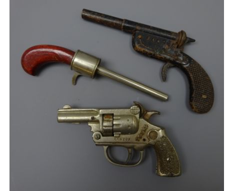 1930s Kenton Texas Revolver type cap gun and two toy Pistol type guns, 'Remando Banger' and Bing of Nuremberg (3) Condition R