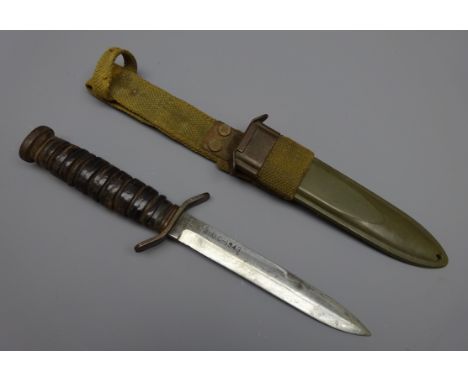 WW2 American M3 Combat knife 16.6cm single edged blade stamped US M3-UC-1943, leather washer ribbed grip with turn down cross