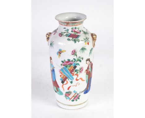 19th CENTURY FAMILLE ROSE PORCELAIN TWO HANDLE VASE OF HIGH SHOULDERED FORM with moulded captive Dog of Fo mask capped captiv