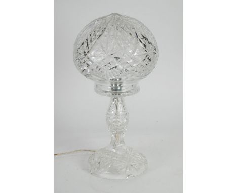 1930s STYLE CUT GLASS TABLE LAMP with orbicular shade, baluster column and domed foot, 15 1/4" (38.8cm) high