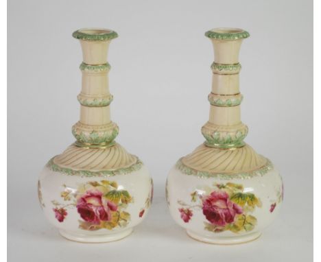 A PAIR OF LOCKE AND CO., WORCESTER PORCELAIN IVORY GROUND VASES, globe  and shaft shaped with triple ringed long necks, spira