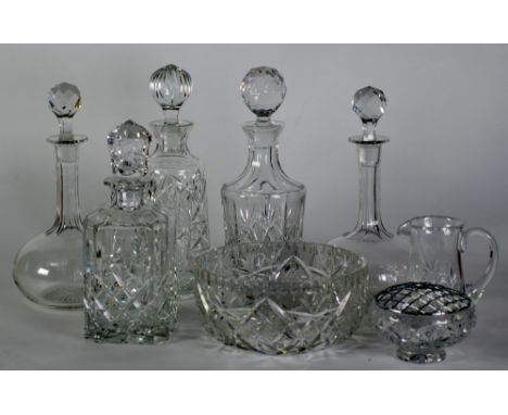 A PAIR OF VICTORIAN STYLE GLOBE AND SHAFT DECANTERS, FOUR OTHER MODERN CUT GLASS DECANTERS, three cut glass fruit bowls, appr