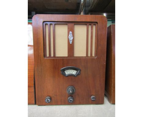 A Cossor Melody Maker 357 kit radio in Art Deco walnut veneered wooden case. C.1935 