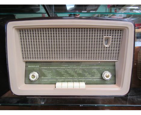 A Barclay valve radio, serial number 51819, with Yugoslavia ferrite aerial, curved rectangular wooden case with plastic speak