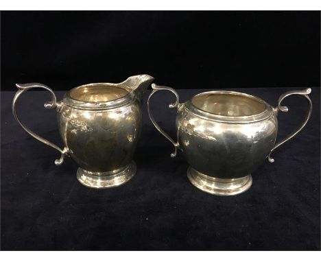 Mappin and Webb silver cream jug and sugar basin, hallmarked London and with original receipt of purchase 