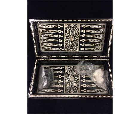 Moorish theme black and white inlaid hinged chess board with backgammon on the reverse.