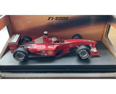 Rubens Barrichello signed Hot Wheels Racing Ferrari F1-2000 Model 1:18 Scale. Orignal Boxed. Good condition. All autographs c