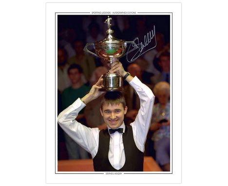 Autographed STEPHEN HENDRY 16 x 12 Photo Edition : Col, depicting Scotland's STEPHEN HENDRY holding aloft the Embassy World S