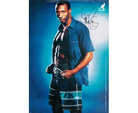 Linford Christie signed 12x8 inch Kangol colour promo photo. Linford Christie OBE (born 2 April 1960) is a Jamaican-born Brit