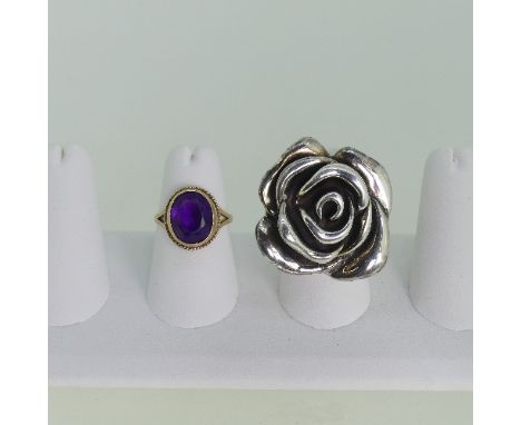 An oval facetted amethyst Ring, mounted in 9ct gold, Size K½, approx total weight 4g, together with a large contemporary silv