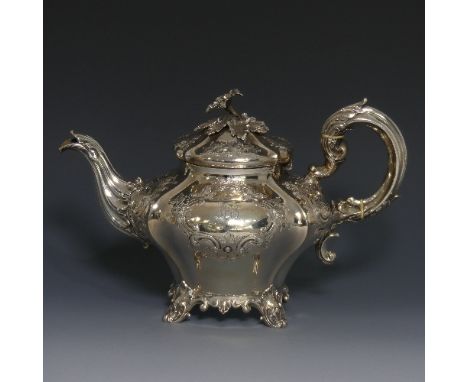 A Victorian silver Teapot, by Charles Reily &amp; George Storer, hallmarked London, 1843, of melon form with elaborate foliat