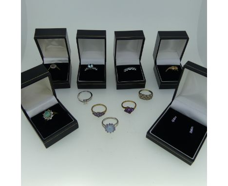 A collection of six QVC 9ct gold Rings, variously set with blue and purple stones, no certificates, Sizes R and S, together w