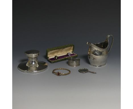 A small George III silver Cream Jug, hallmarked London, 1807, of oval form with reeded handle, with bright cut Greek Key deco