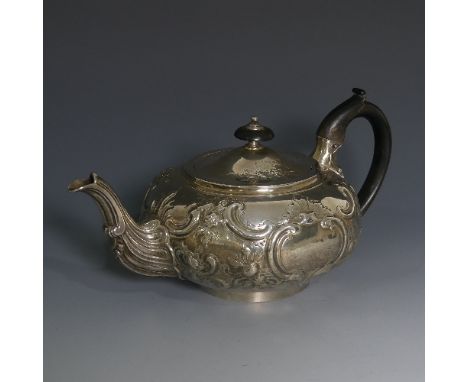 A George III silver Teapot, by&nbsp;Robert Garrard I, hallmarked London, 1812, of circular form with foliate decoration, flut