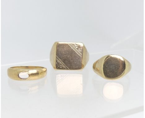 A large 9ct yellow gold Gentleman's Signet Ring, the square front with engraved corners, Size X, together with two other smal