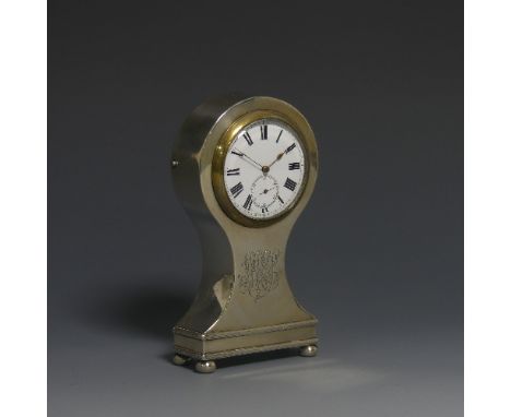 An Edwardian silver mounted Mantle Clock, makers mark rubbed, hallmarked Birmingham, 1906, of balloon shape, raised on bun fe