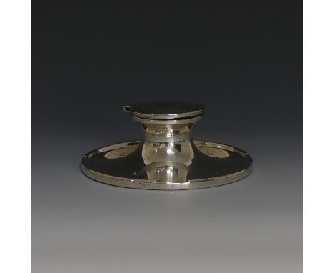 A George V silver Capstan Inkwell, by A &amp; J Zimmerman Ltd., hallmarked Birmingham, 1912, hallmarks rubbed,&nbsp;of tradit
