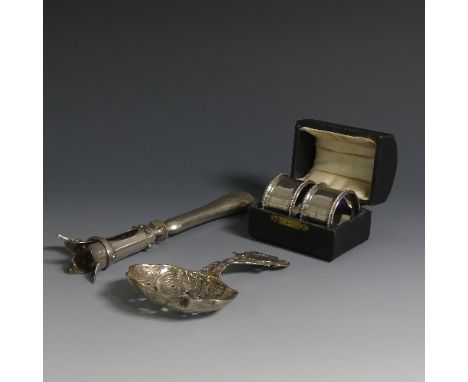 A cased pair of George VI silver Napkin Rings, by Francis Howard Ltd., hallmarked Birmingham, 1945, of plain circular form wi