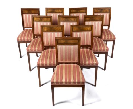 A set of ten Dutch mahogany dining chairs,First quarter 19th century,Each covered in striped pink material.,89x37x47 cm,,