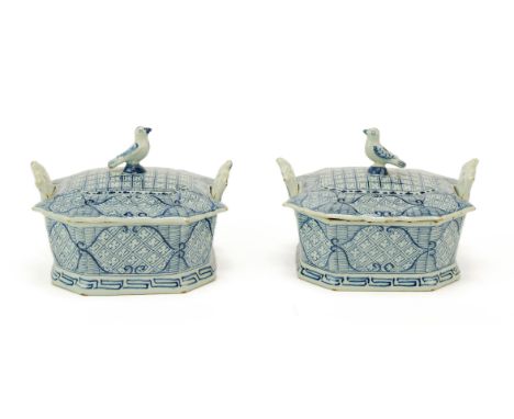 A pair of Dutch Delft blue and white butter dishes with bird finials,18th century, Netherlands,The exterior with an intricate
