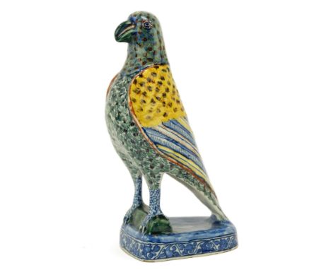 A Dutch polychrome Delft model of a parrot,18th century, Netherlands,A superb bird figure, richly decorated, looking straight