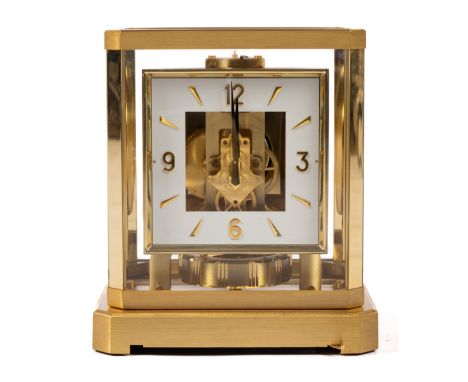 A Jaeger-LeCoultre gilt-brass Atmos clock,Second quarter 20th century,With typical square gilt-brass case with glazed sides, 