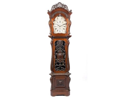 An Edwardian mahogany longcase clock,By J.W. Benson, London, ca. 1900-10,The case and hood with carved and openwork foliate s
