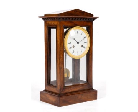 A Restauration mahogany mantel clock 'pendule cage',First half 19th century,The mahogany case with dentilled cornice and glaz