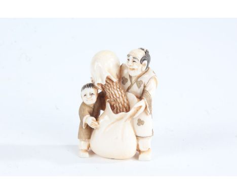 Japanese Meiji period carved ivory netsuke, in the form of a man and boy pouring grain into a sack, marked to base, 4.5cm hig