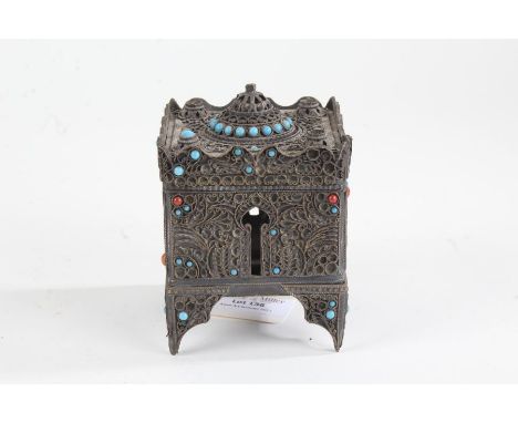 Eastern white metal box, of architectural form, mounted with turquoise and coral coloured stones, 7cm wide x 10cm high