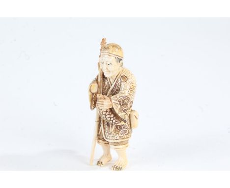 Japanese Meiji period carved ivory netsuke, in the form of a fisherman, with character mark (AF), 5.5cm high