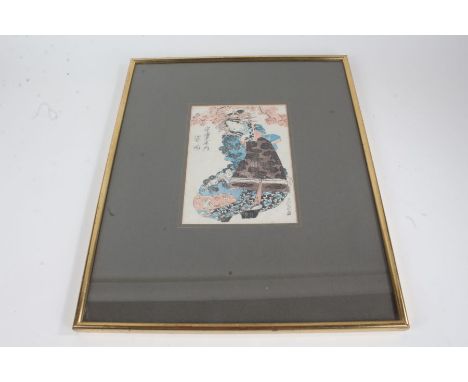 Japanese woodcut coloured print, depicting a figure underneath blossom, with character marks, housed within a gilt and glazed