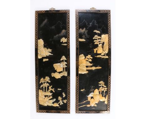 Pair of Chinese ebonised panels with raised mother of pearl depictions of trees, rocks and buildings, 30.5cm x 91.5cmLosses a