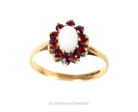 A 9ct gold, opal and garnet cluster ring, size K, 1.6g.