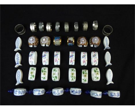 A collection of napkin rings, mainly in sets, including Countess Bone China, Hammersley Bone China, Norwegian pewter, silver 