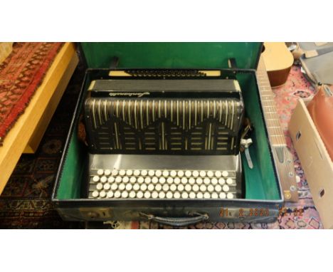 An old cased accordion