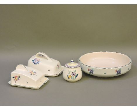 Four pieces of Poole pottery, with floral sprig decoration