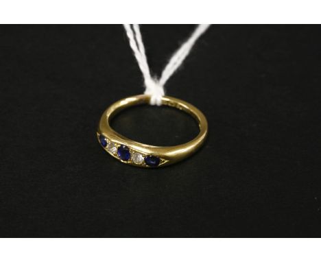 An 18ct gold Edwardian sapphire and diamond ring, London 1904