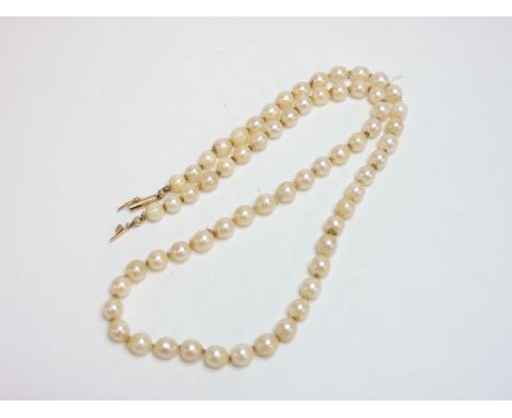 A single row uniform cultured pearl necklace, with a gold barrel clasp marked 14K, a row of agate beads, a pair of Monet earr