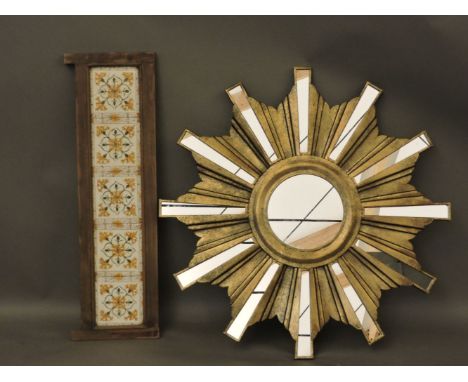 A sunburst wall mirror, with multiple plates, centred with a roundel, 82cm diameter, and a tile back, 84cm wide